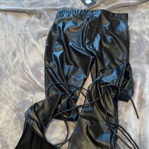 Black leather pants stings wrap around ankle with a hem bottom fashionnova